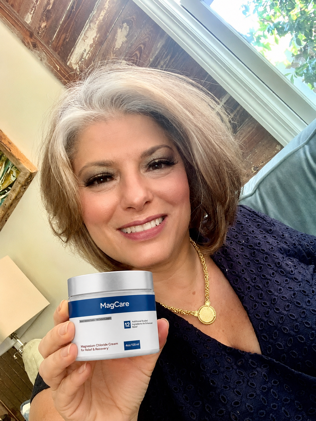 Marianne holding MagCare Magnesium Cream