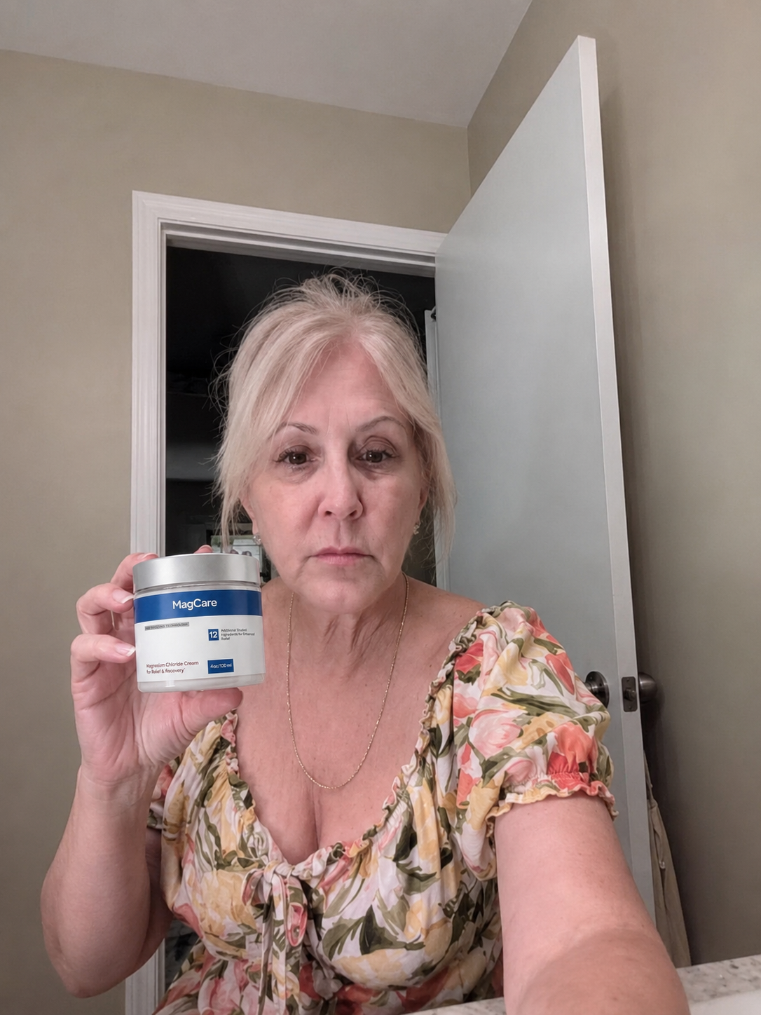 Sarah holding MagCare Magnesium Cream